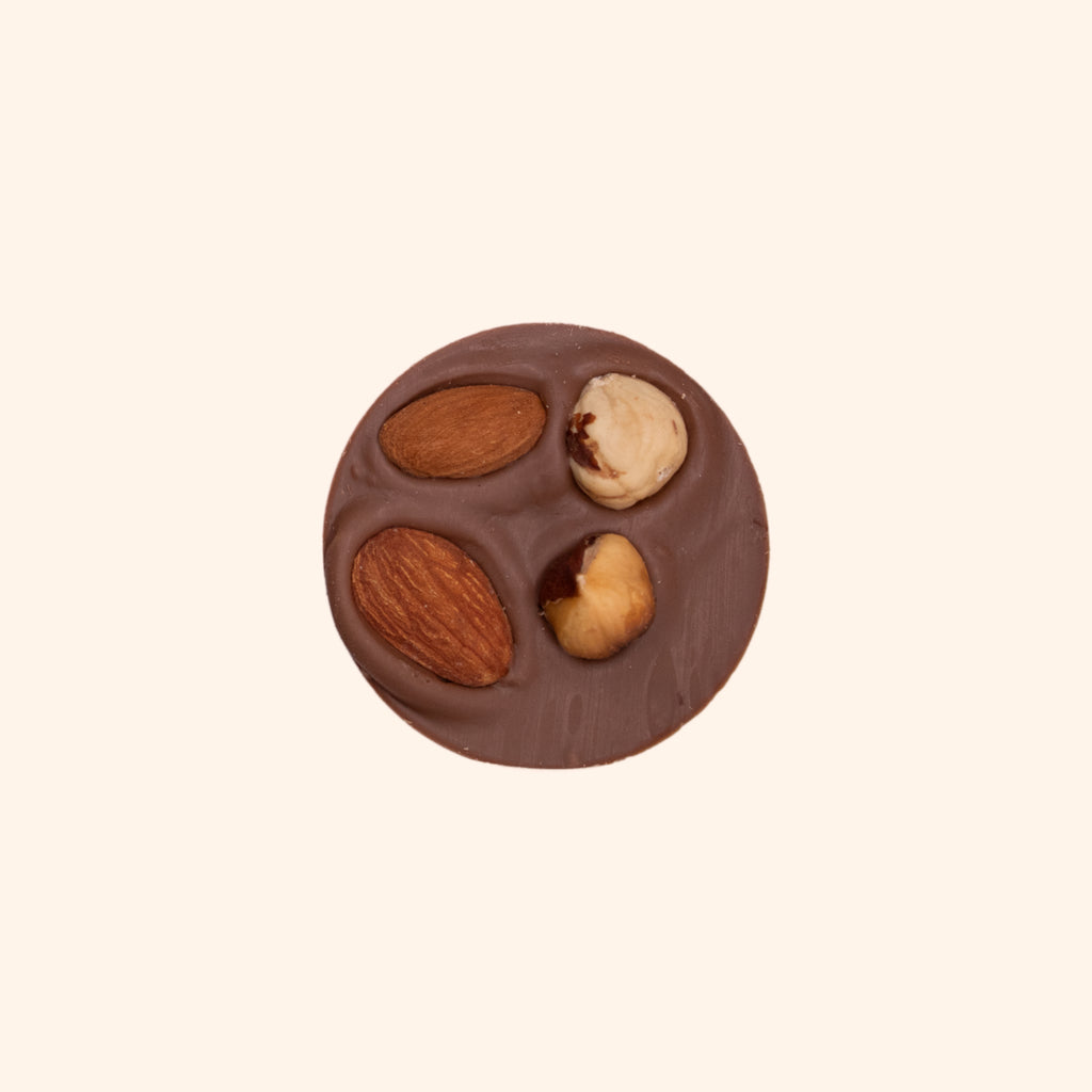 Soles de Chocolate de Leche 38% Cacao